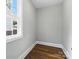 Small room with hard surface floors and a bright window at 424 Fulton Dr, Kings Mountain, NC 28086