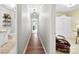 Hallway view showcasing hardwood floors, bathroom and bedroom views at 459 Cramerton Rd, Gastonia, NC 28056