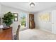 Inviting office space featuring natural light from window and antique cabinet at 459 Cramerton Rd, Gastonia, NC 28056