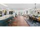 Spacious open floor plan featuring a kitchen island, dining area, and living room at 459 Cramerton Rd, Gastonia, NC 28056