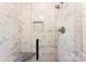 Modern shower with tiled walls, rainfall showerhead, and a built-in niche at 459 Cramerton Rd, Gastonia, NC 28056