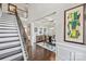 View of the dining room with modern decor, coffered ceilings, and hardwood floors at 4607 Bonroi Ave, Charlotte, NC 28213