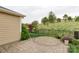 Backyard featuring a patio and surrounding trees, a private outdoor space for relaxation and entertainment at 4991 Looking Glass Trl, Denver, NC 28037