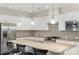 Modern kitchen featuring granite countertops, stainless steel appliances, and ample cabinet space at 4991 Looking Glass Trl, Denver, NC 28037