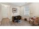 Comfortable office space includes a desk, chair, and bright window with natural lighting at 4991 Looking Glass Trl, Denver, NC 28037