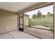 Enclosed porch featuring a beautiful view of the backyard and surrounding trees offers a relaxing retreat at 4991 Looking Glass Trl, Denver, NC 28037
