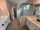Bathroom with double sink vanity, large glass shower with white subway tile and matte black fixtures at 5006 Mclaughlin Dr # 103, Waxhaw, NC 28173
