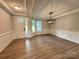 Dining room area with a modern light fixture and a view of the entryway at 5006 Mclaughlin Dr # 103, Waxhaw, NC 28173