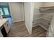 Walk-in pantry with wire shelving for ample storage at 5006 Mclaughlin Dr # 103, Waxhaw, NC 28173