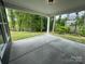 Covered patio shows the green grass in the backyard at 5006 Mclaughlin Dr # 103, Waxhaw, NC 28173