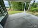 View from the patio showing the green back yard at 5006 Mclaughlin Dr # 103, Waxhaw, NC 28173