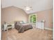 Cozy bedroom with a ceiling fan, vaulted ceiling and natural light at 511 Pembroke Ln, Waxhaw, NC 28173