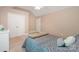 Bedroom featuring a bed, vaulted ceiling, fan and closet at 511 Pembroke Ln, Waxhaw, NC 28173