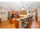 Spacious kitchen with wooden cabinets, granite countertops, stainless steel appliances, and breakfast bar at 511 Pembroke Ln, Waxhaw, NC 28173