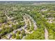 Aerial view showcasing a neighborhood with mature trees and well-spaced homes at 511 Pembroke Ln, Waxhaw, NC 28173