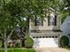 Charming two-story home with a two-car garage and mature trees at 5304 Silabert Ave, Charlotte, NC 28205