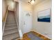 Welcoming foyer with hardwood floors and staircase at 5304 Silabert Ave, Charlotte, NC 28205