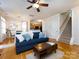 Inviting living space with hardwood floors, open to dining and kitchen at 5304 Silabert Ave, Charlotte, NC 28205