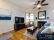 Bright living room features hardwood floors, fireplace, and natural light at 5304 Silabert Ave, Charlotte, NC 28205