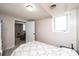 Bright bedroom features a window and transitions to the rest of the house through an open door at 542 9Th Nw St, Hickory, NC 28601