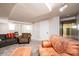 Basement living room with carpeted floors and cozy seating at 542 9Th Nw St, Hickory, NC 28601
