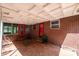 Back patio featuring brick and tile, offering an outdoor space that blends with the home's exterior at 542 9Th Nw St, Hickory, NC 28601