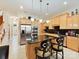 Modern kitchen featuring stainless steel appliances, granite countertops, and a stylish island with bar seating at 6133 Wakehurst Rd, Charlotte, NC 28226