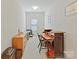 Home office space with desk, file cabinet, and bright natural light at 6133 Wakehurst Rd, Charlotte, NC 28226