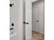 This bathroom features updated hardware and a white tiled shower and door at 7141 Pitchfork Ln, Mint Hill, NC 28227