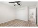 This bedroom features light neutral walls, updated flooring and a closet for storing your personal belongings at 7141 Pitchfork Ln, Mint Hill, NC 28227