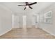 This bedroom features light neutral walls, updated flooring and multiple doors at 7141 Pitchfork Ln, Mint Hill, NC 28227