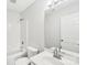 Modern bathroom with shower, tub, and large vanity mirror at 759 Victory Gallop Ave, Clover, SC 29710