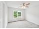 Bedroom with carpet, neutral walls, ceiling fan and a window at 759 Victory Gallop Ave, Clover, SC 29710