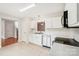 Eat-in kitchen featuring white cabinets, stainless steel appliances, and tile flooring at 759 Victory Gallop Ave, Clover, SC 29710