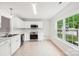 Bright kitchen featuring white cabinets, stainless steel appliances, and large window at 759 Victory Gallop Ave, Clover, SC 29710