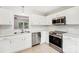 Modern kitchen featuring white cabinets, stainless steel appliances, and tile flooring at 759 Victory Gallop Ave, Clover, SC 29710