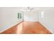 Bright living room featuring wood floors, white walls, and a large window at 759 Victory Gallop Ave, Clover, SC 29710
