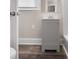 Bathroom showcasing a gray vanity with a bright mirror with modern fixtures at 816 Echo Glen Rd, Charlotte, NC 28213