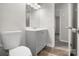 Modern bathroom featuring a sleek vanity, contemporary lighting, and neutral color palette at 816 Echo Glen Rd, Charlotte, NC 28213
