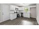 Bright kitchen featuring stainless steel appliances, white cabinetry, and ample counter space at 816 Echo Glen Rd, Charlotte, NC 28213