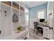 Stylish mudroom/office featuring built-in storage, a desk, and modern decor, creating an organized and functional space at 9217 Rock Water Ct, Waxhaw, NC 28173