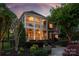 Beautiful brick home with a large screened porch and a cozy patio area at 9217 Rock Water Ct, Waxhaw, NC 28173