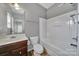 Bathroom featuring a shower and tub combination and a vanity with storage at 9862 Walkers Glen Nw Dr, Concord, NC 28027