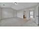 Neutral bedroom with an attached ensuite at 9862 Walkers Glen Nw Dr, Concord, NC 28027