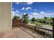 Exterior shot of a wood deck offering outdoor space with a neighborhood view at 9862 Walkers Glen Nw Dr, Concord, NC 28027