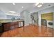 The laundry room is conveniently located off of the kitchen with stainless steel appliances at 9862 Walkers Glen Nw Dr, Concord, NC 28027