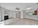 Bright living room featuring a fireplace and open access to other spaces at 9862 Walkers Glen Nw Dr, Concord, NC 28027