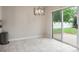 Open dining area with access to the backyard through sliding glass doors at 1004 Toquima Trl, Monroe, NC 28110
