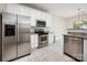 Kitchen with stainless steel appliances, granite countertops and white cabinets at 1004 Toquima Trl, Monroe, NC 28110
