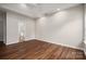 Spacious main bedroom featuring wood floors and an ensuite bathroom at 1004 Toquima Trl, Monroe, NC 28110